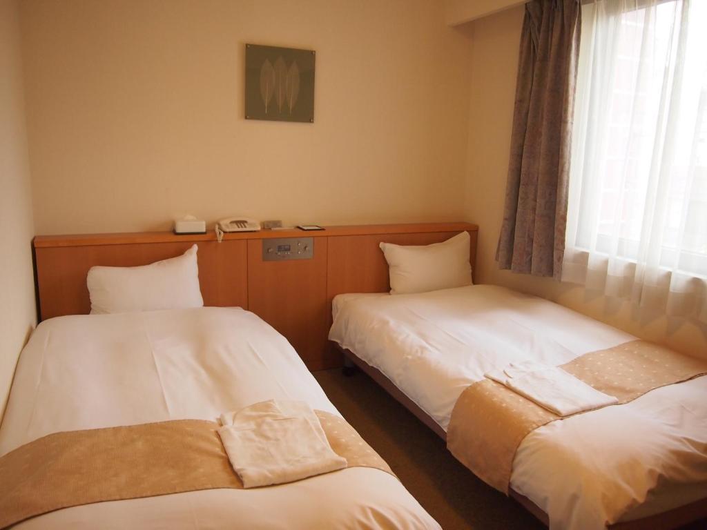 Nest Hotel Кумамото Стая снимка